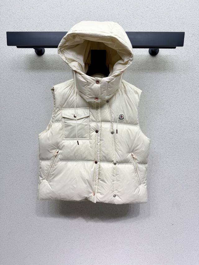 Moncler down vest, understated yet sophisticated, classic design, super warm, s