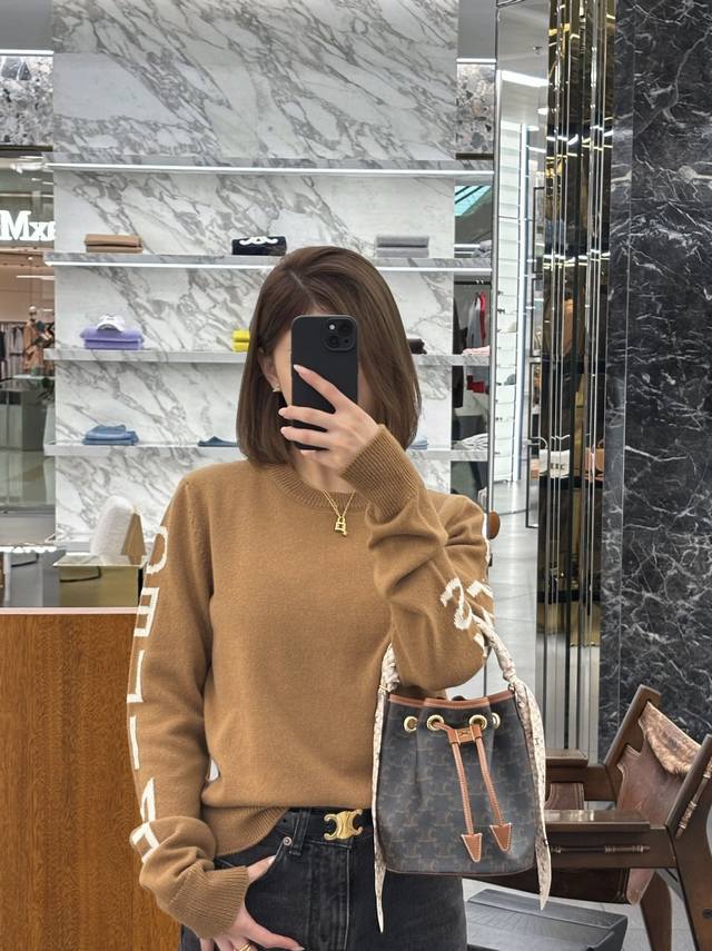 Ce 25 Autumn/Winter New Arrival Letter Jacquard Knit Sweater. The sleeves featur