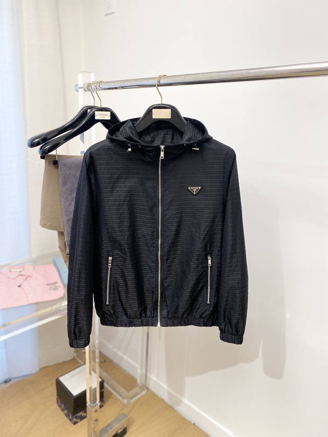 Prada, 2025 New Arrival Jacket, stylish and chic, featuring a triangular logo o
