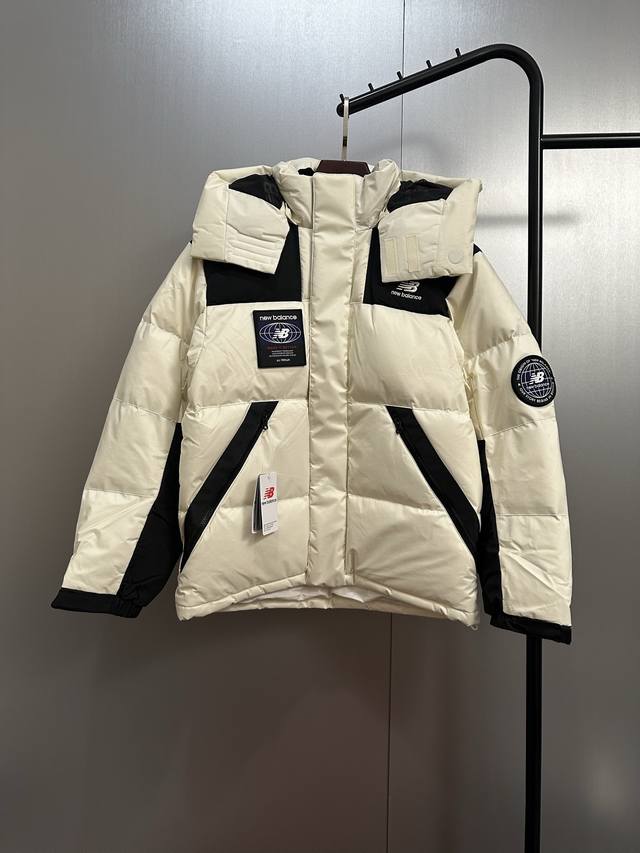 Nb Badge Down Jacket Down: Filled with 800 fill power goose down, excellent resi