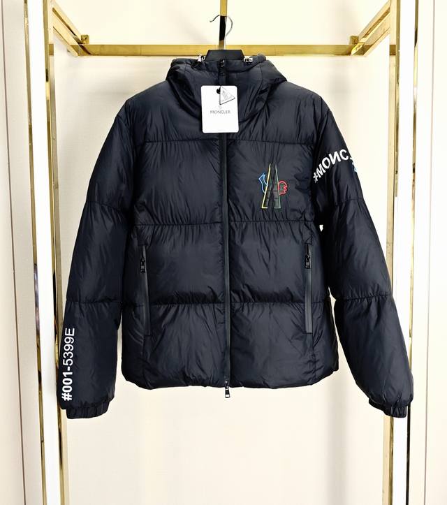 Moncler Solayan Three-Label Logo Down Jacket. Featuring seasonally iconic decora