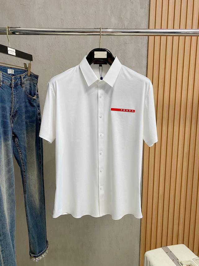 Prada 25Ss Spring/Summer New Polo Shirt with Lapel. Made from select Tencel cot