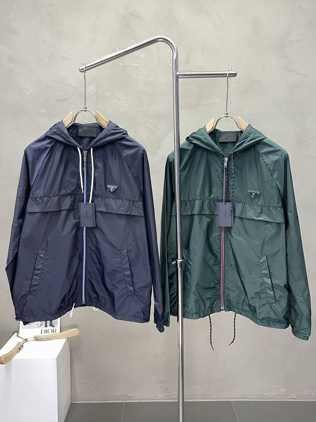 Prada Exclusive: Latest Fashion Spring/Summer Recycled Nylon Hooded Jacket. A c