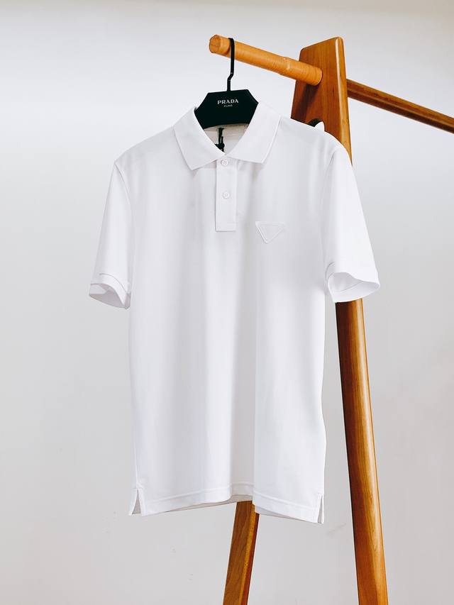 Prada 2025 Spring/Summer New Arrival Classic Triangle Logo Polo Shirt. As a ren