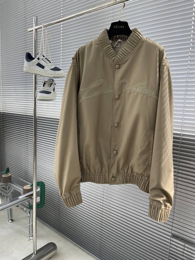 This new Louis Vuitton belted jacket is crafted from a lightweight twill cotton