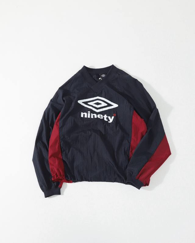 9090 X Umbro Nylon Pullover Custom-woven and dyed pleated nylon fabric with draw