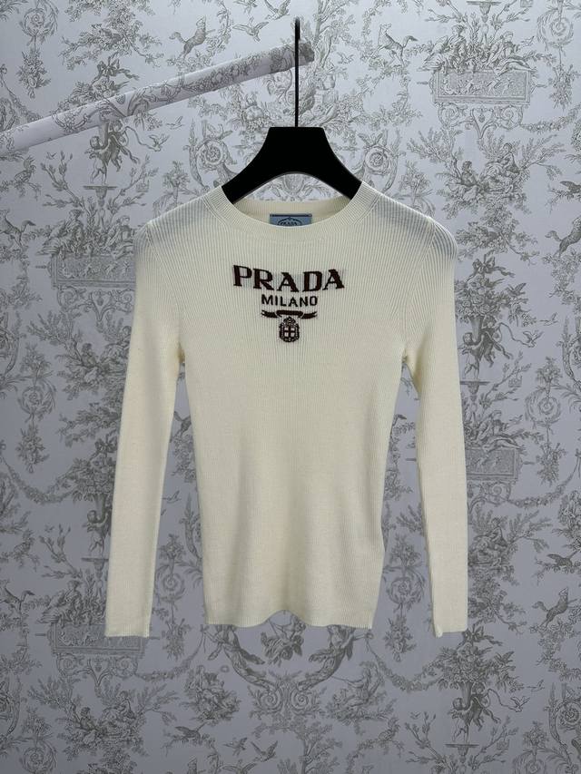 Prada 25Ss New Printed Plain Knit Top. This plain knit top features long sleeve