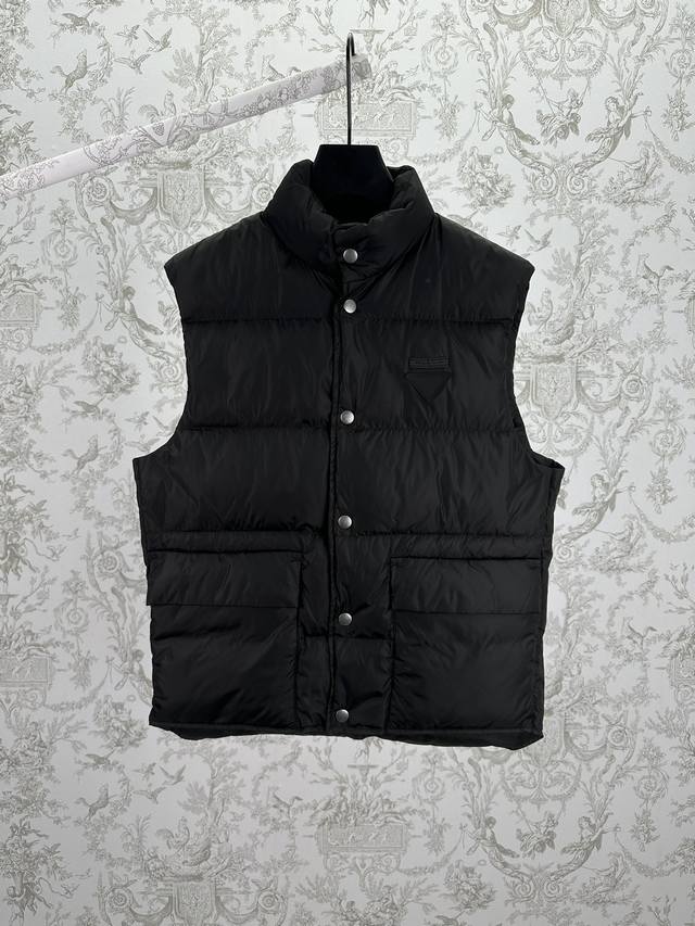 Prada 25Ss New Re-Nylon Vest. This sporty, multi-functional vest is made of Re-