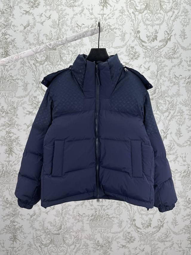 Louis Vuitton 25Ss New Monogram Tiered Jacket. This down-filled tucked jacket i