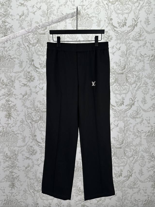 Louis Vuitton 25Ss New Tech Track Pants. These track pants are made from a tech