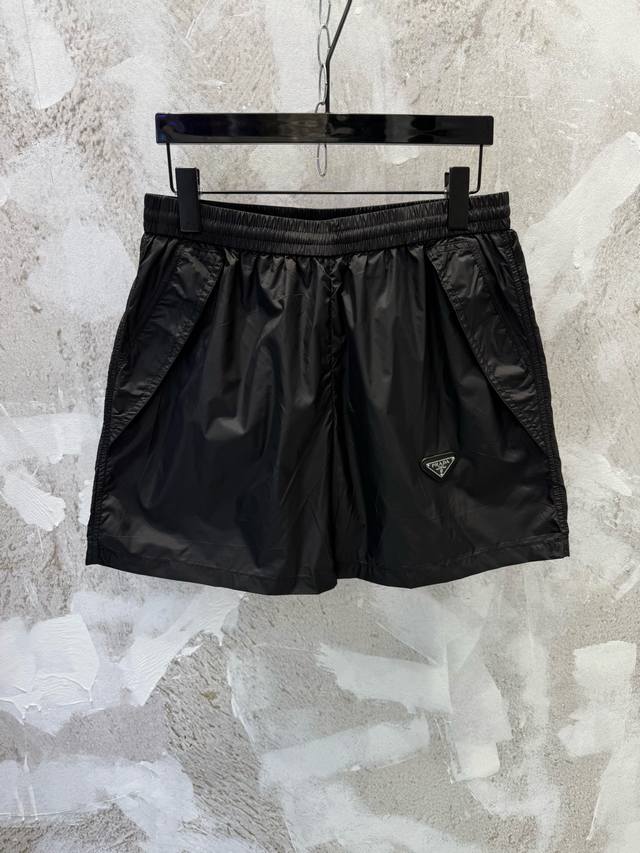 Prad Triangle Logo Zippered Pocket Nylon Shorts . Custom-made recycled nylon f