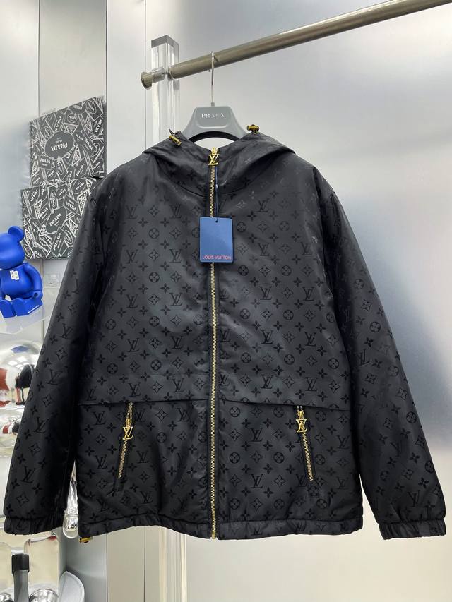 LV Louis Vuitton 2025 Winter New All-over Logo Down Jacket with Hood. A runway n