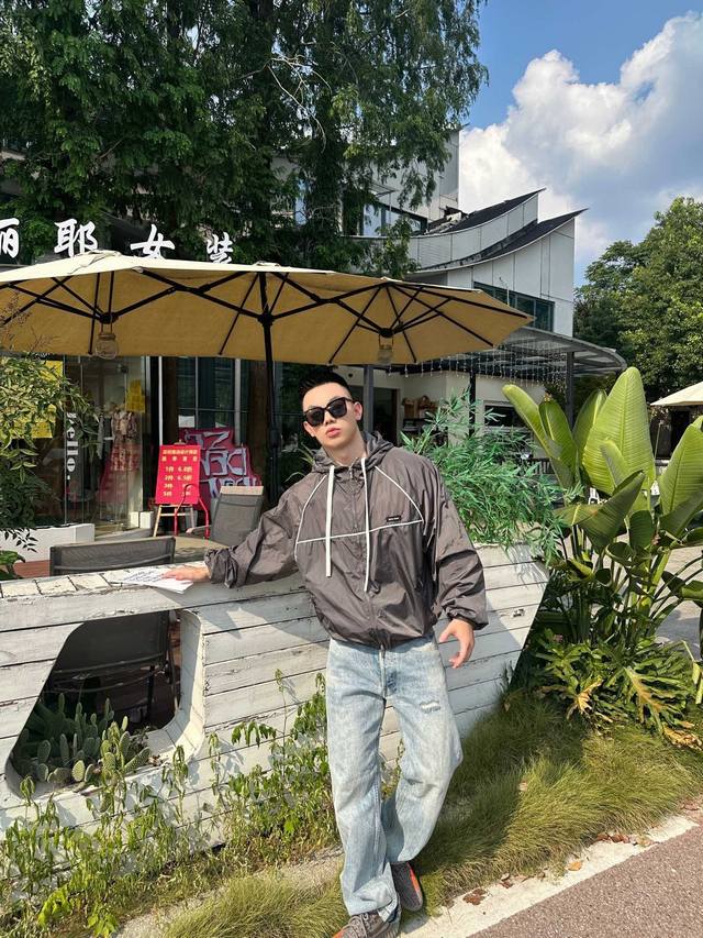 Miumiu Zipper Hooded Jacket. Made with custom-designed cold-pressed, intelligent