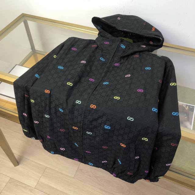 This new jacket is crafted from black cotton fabric with delicate lace detailin