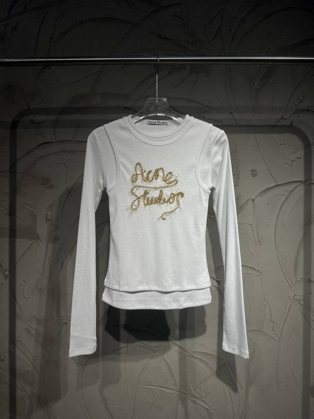 Acne Studios' new faux two-piece design. Acne's faux two-piece style has reache