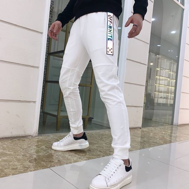 Off brand new spring/summer style shiny casual pants with all three labels intac