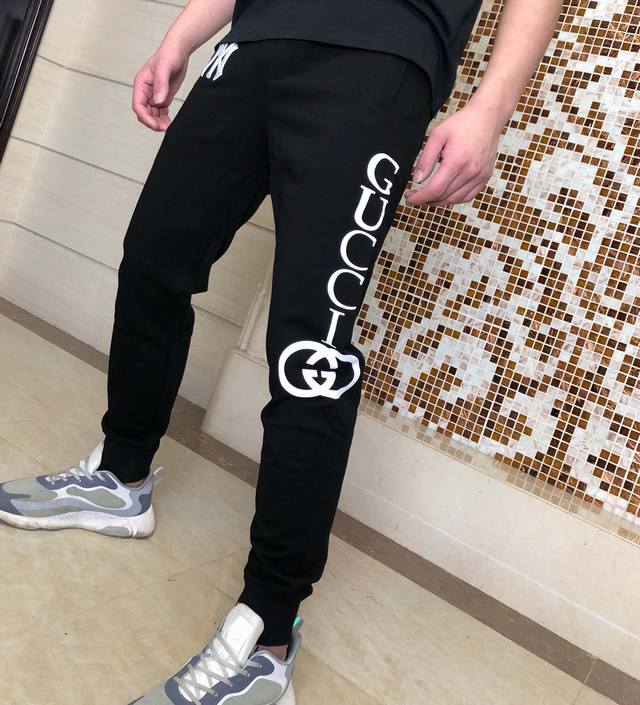 Guc20 Spring/Summer European-style casual trousers, creating a handsome and styl