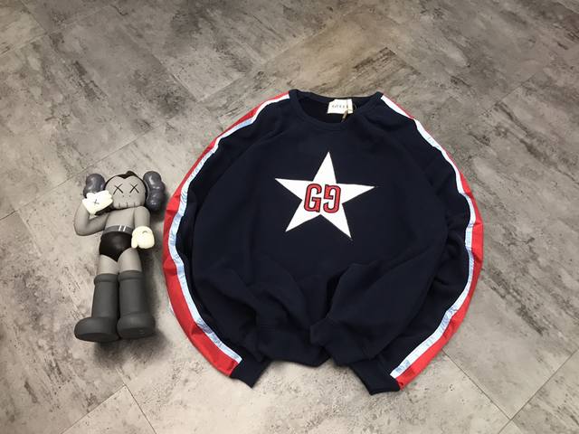 Gucci five-pointed star double G embroidered sweatshirt. The design is both styl