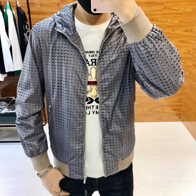 A**Ani Armani's new autumn/winter men's hooded trench coat is now available on t