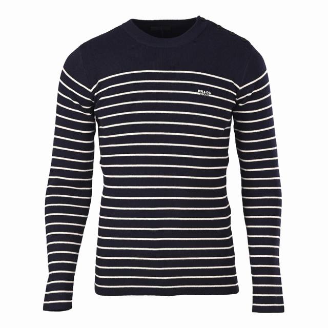 Prada striped knit sweater with shoulder buttons and side opening. Made of cust