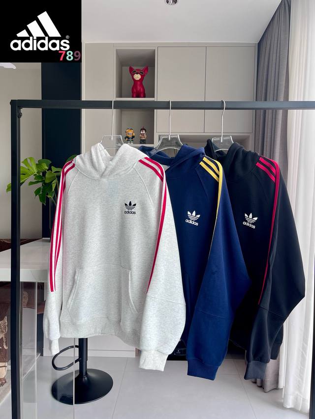 Adidas Originals Color Block Three Stripes Hoodie This Adidas Originals casual