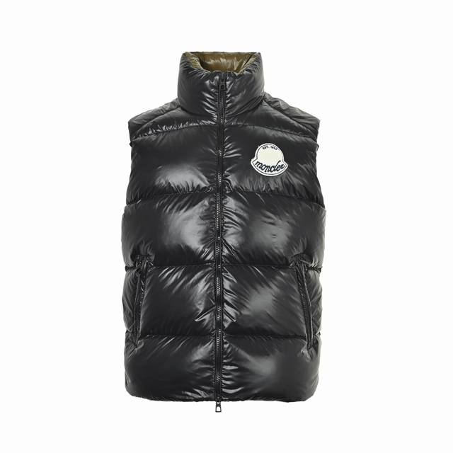 Moncler Sumido Towel Logo Down Vest. This Moncler Sumido series down vest featur