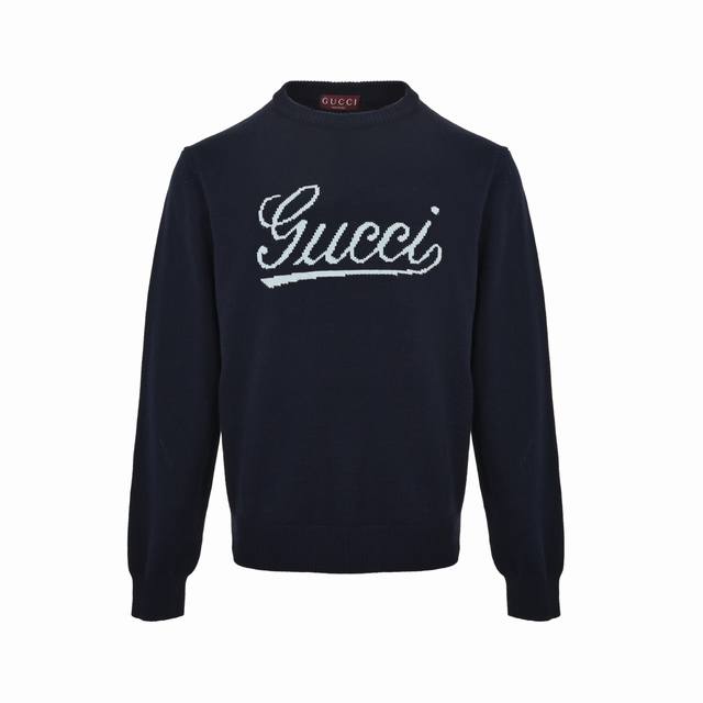 Gucci Signature Logo Jacquard Crew Neck Sweater. Made of 55% sheep's wool and 45