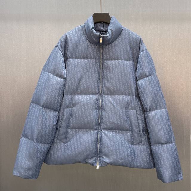 Cd Jacquard Blue Down Jacket Size: S-XL This down jacket highlights Dior's class