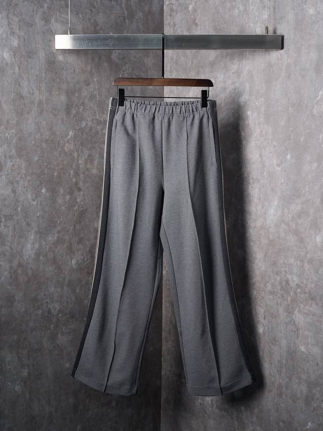 Real item hanging photo: Miu Miu embroidered logo striped patchwork casual trous