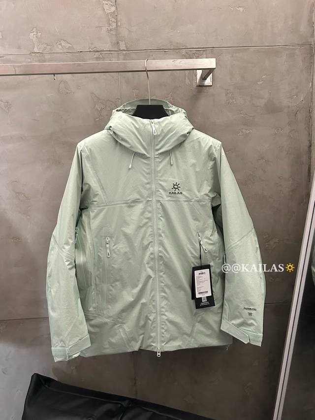 Kailas Aspen Goose Down Jacket in Ice Lake Green (details).