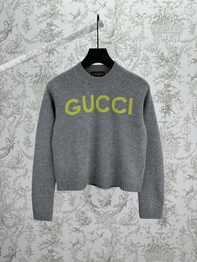 G Brand 25Ss New Women's Gucci Intarsia Wool Top. The Gucci logo adds a touch of