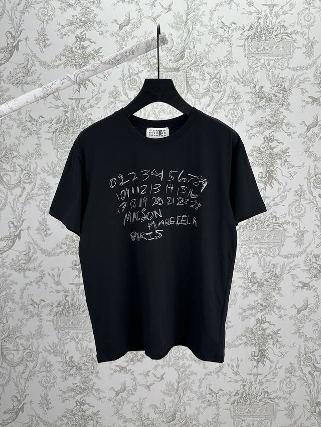 Majira 25Ss New Digital Cotton T-Shirt. This cotton T-shirt reinterprets Maison'