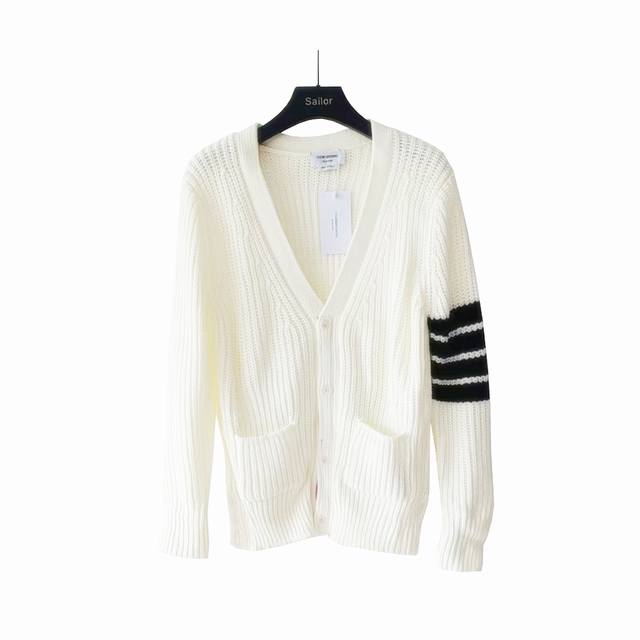 Real shot details + details Thom Browne. Four-stripe knitted four-button chunky