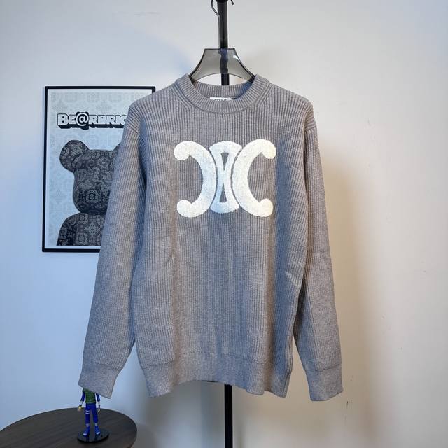 Style No. D111 Celine Terry Embroidered Crew Neck Sweater. This is a versatile