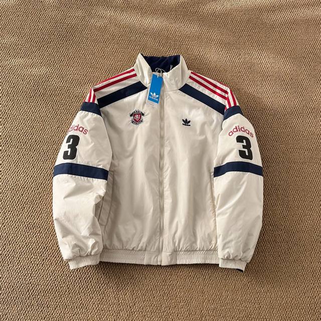 Adidas Originals Fall/Winter New Reversible Puffer Jacket The small logo on the