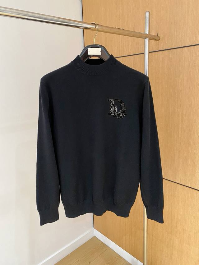 Dior turtleneck sweater, made with a wool blend yarn, offers excellent warmth,