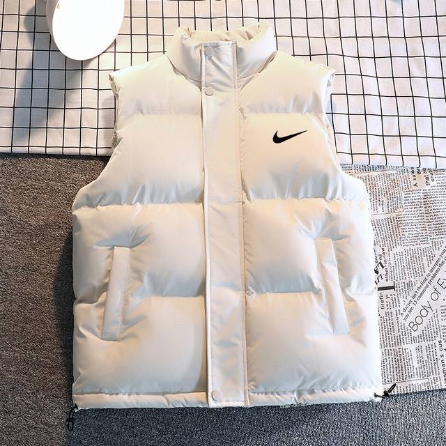 New Arrival! This winter's newest Nike single-swoosh print cotton vest! The whol