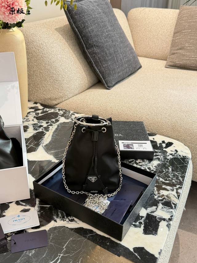 Prada Black and Silver Chain Bucket Bag ( ) This Prada black and silver chain b