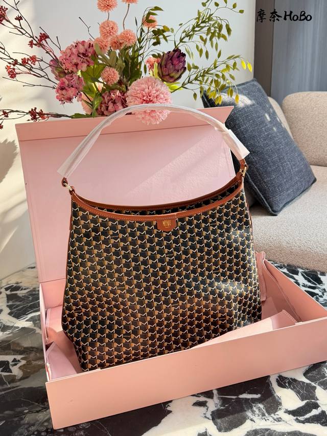 Moynat Hobo Bag This is a Moynat Hobo bag, featuring a classic M-shaped canvas d