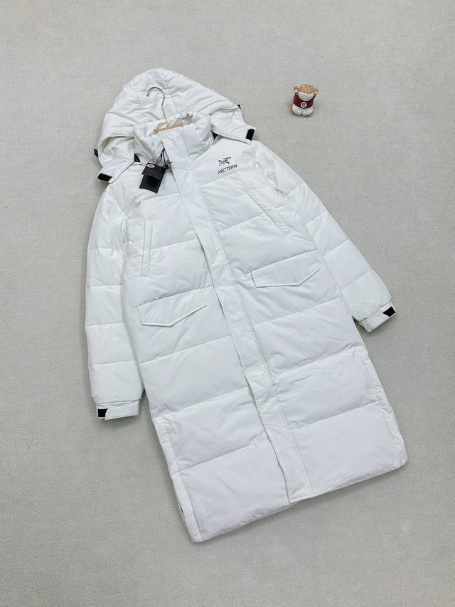 Order No. 12273. The Arc'teryx men's long down jacket conquers all seasons with