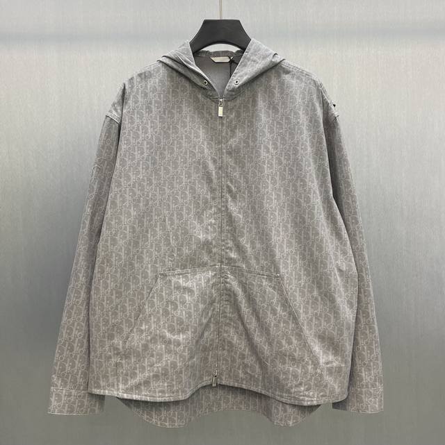 Cd Hooded Zip-Up Shirt Size: S-XL This hooded zip-up shirt features an all-over