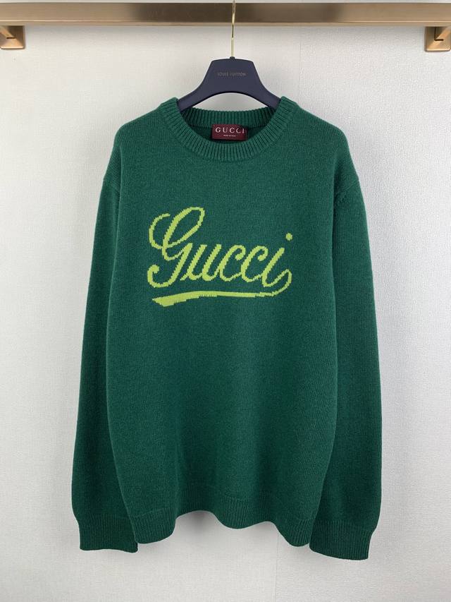 Gucci Embossed Knit Wool Sweater The main body is green knit with a handwritten