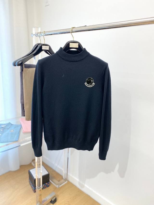 Moncler's new turtleneck wool sweater features a delicate and soft feel, allowi