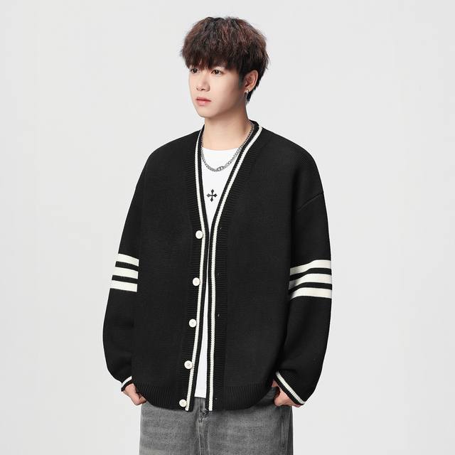 Thom Browne's classic basic knit cardigan, a high-quality sweater for couples. A