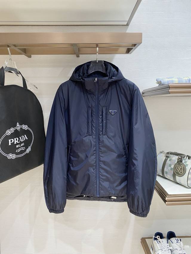 Premium Down Prada Re-Nylon Limited Edition Down Jacket. Filled with goose down.