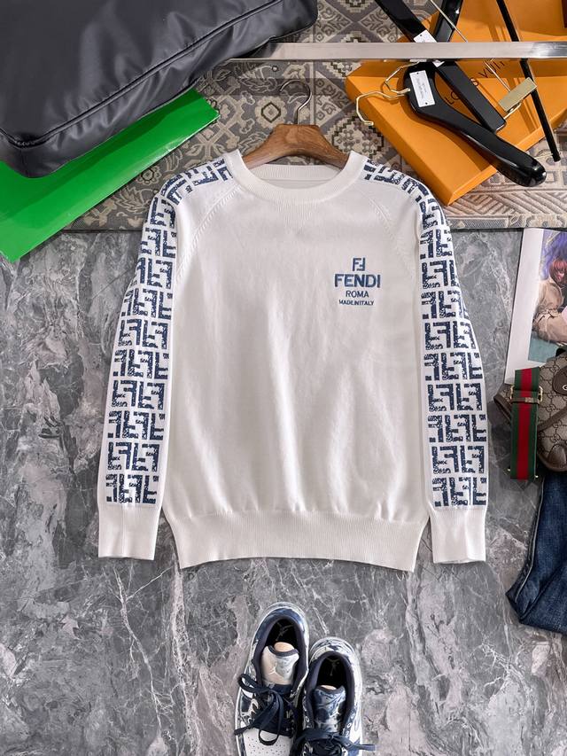 Fendi Crew Neck Sweater, made with a wool blend yarn, offers excellent warmth, a
