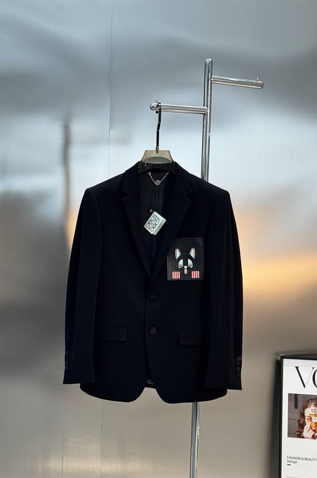 Loewe's new single-breasted two-button suit features a classic design, clean lin