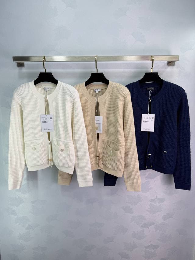 Ch*26C New Chanel-style jacket, featuring the iconic double-C metal buttons, ele