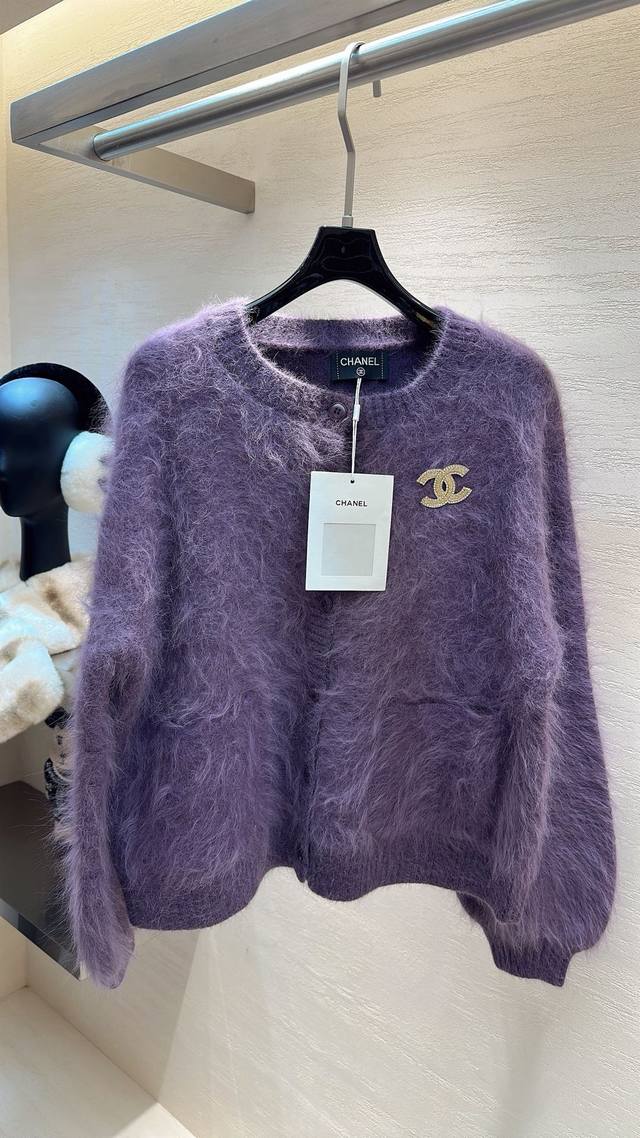 This Chanel mink cardigan is a perfect blend of luxury and gentleness. The fluf