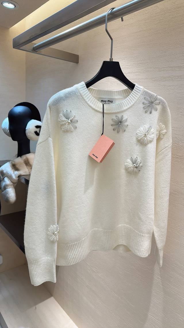 Miu Miu - Breathtakingly exquisite! The flowers are embroidered and pieced toget